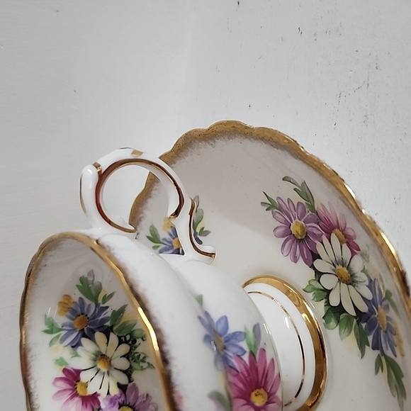 Pretty Rosina Teacup and Saucer Duo Accentuated with Daisies and Heavy Gold Bord - Picture 7 of 9
